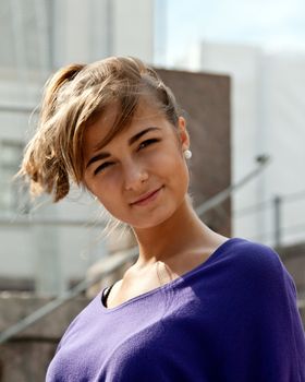 portrait of a beautiful girl in the street