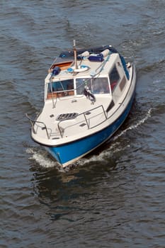 motor boat floating down the river