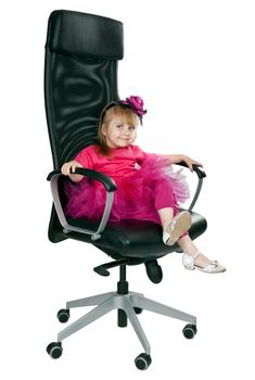 little girl in an office chair black on a white background