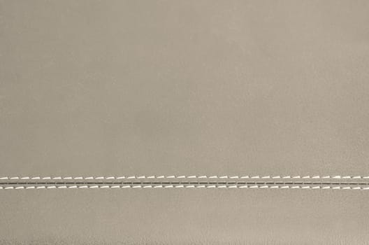 beige  horizontal stitched leather background  