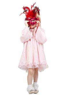 little girl in a red mask in studio isolated on a white background