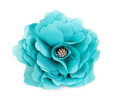 turquoise fabric flower isolated on a white background