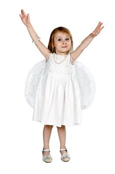little girl with angel wings in the studio on a gray background