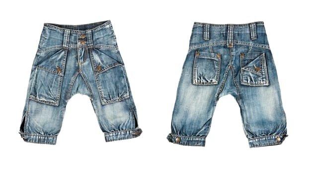 A collage made up of two pairs of trendy jeans for children isolated on white background. The image is composed of several photographs.