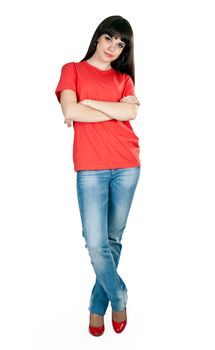 girl in red shoes and blue jeans in the studio on a white background