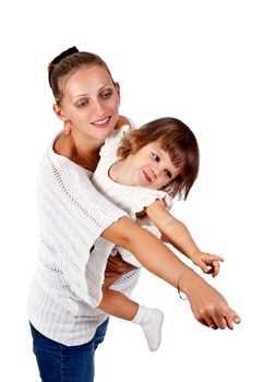 little girl in the arms of my mother, point the finger at the studio isolated on a white background