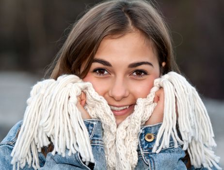 portrait of a girl wrapped in a warm scarf.