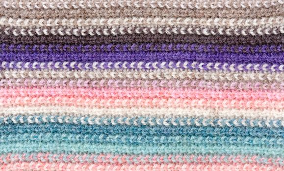 knitted striped colored background.