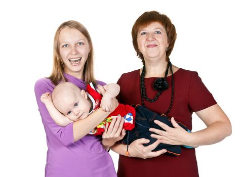 happy family mother, grandmother and a young boy in the studio isolated on white background