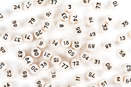 wooden barrels with lotto numbers on a white background