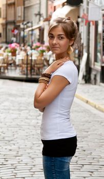 Beautiful girl in the old streets of Stockholm in Sweden