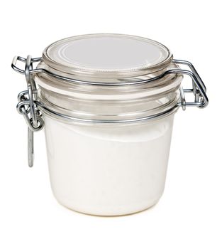 jar of cream with a steel lock on a white background
