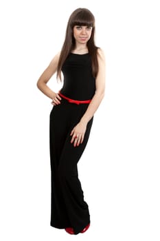 girl in black pants and red shoes in the studio isolated on a white background