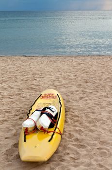 yellow canoe rescue on the sand tropical beach