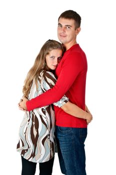 girl hugging a guy in a red dress in the studio on a white background