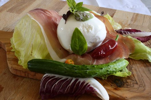 A summer fresh dish with mozzarella and tomato