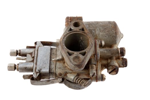 dirty old motorcycle carburetor on a white background