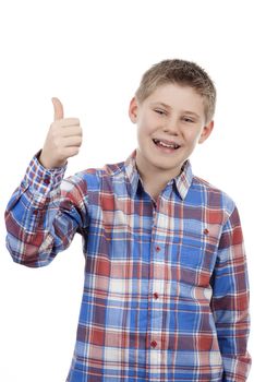 cute boy with thumb up isolated on a white background 
