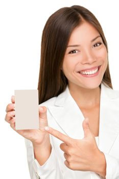 Woman showing holding small blank sign. Replace with smart phone, mobile phone or copy. Smiling happy young business woman. Mixed race Caucasian / Chinese Asian femal model isolated on white background.