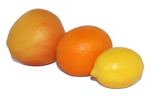 Grapefruit, orange, lemon on a white background