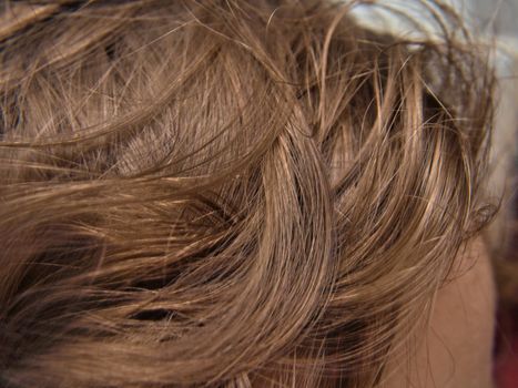 Extreme closeup of dark brown wavy hair