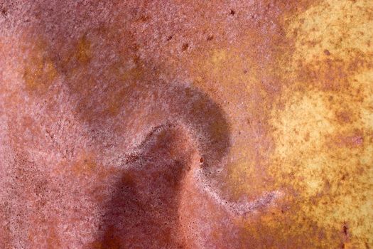 Abstract background rusty, dented metal.