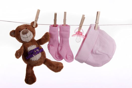 Baby clothes on a clothesline