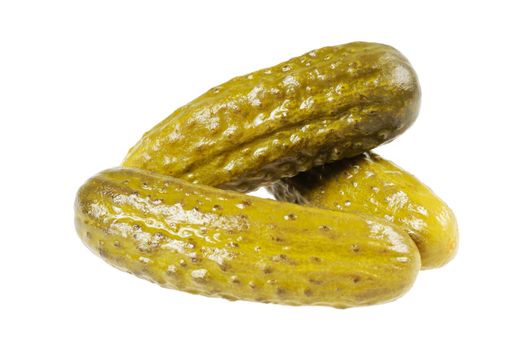 Three pickled  cucumbers.  Gherkins.  Isolated  on white.