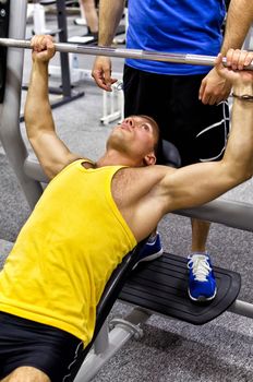 Man doing athlete exercise in fitness club