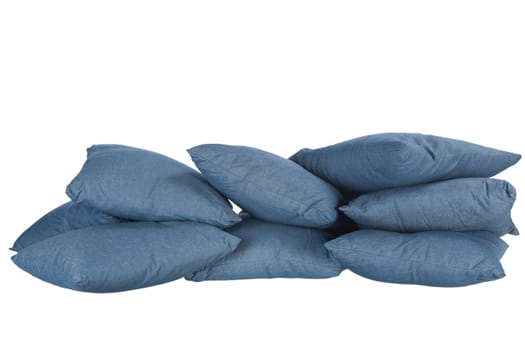 stack of blue denim pillows isolated on white
