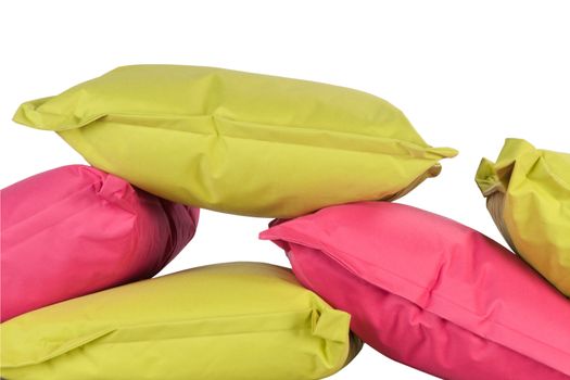 bright pink and green pillows isolated on white