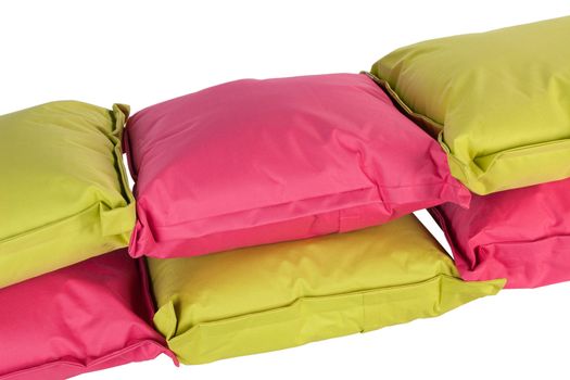 bright pink and green pillows isolated on white