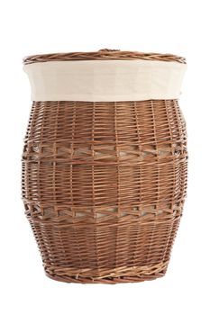 Isolated on white laundry basket made of rattan