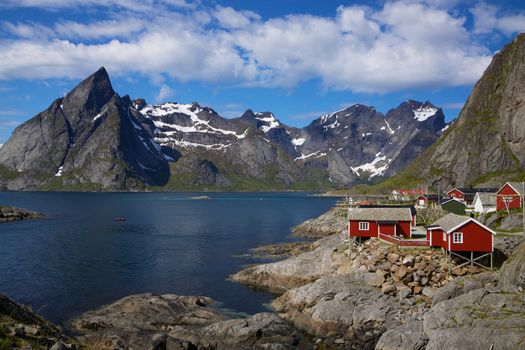 Picturesque fishing village on the coast of fjord on Lofoten islands in Norway