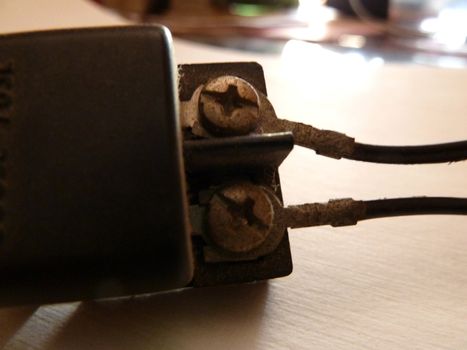 old screw connections on a white background