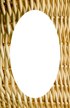 Isolated white oval place for text photograph image in center of interesting texture of walls of wicker basket. Nice background.