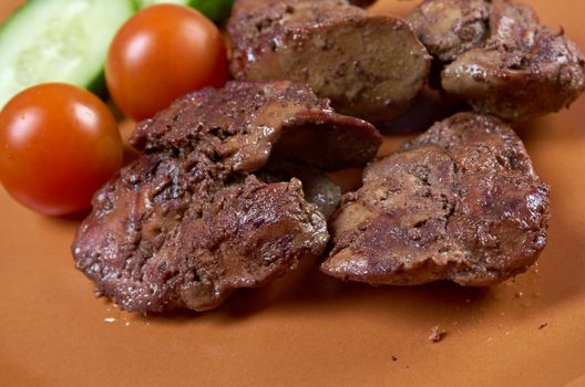 Chicken livers and vegetable.closeup