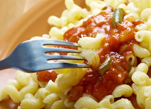 Italian pasta cavatappi and vegetable  tomato sauce