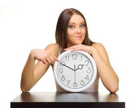 Young girl with clock isolated