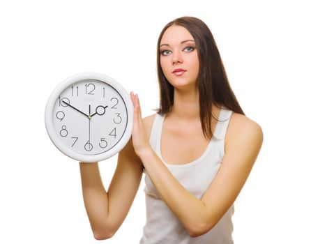 Young woman with clock isolated