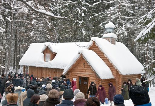 People go to a sacred source to a holiday of the Christening Christ's. The city of Gorodets. Russia.