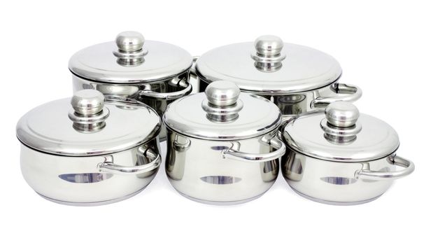 Pans made of stainless steel on a white background