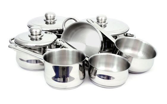 Pans made of stainless steel on a white background