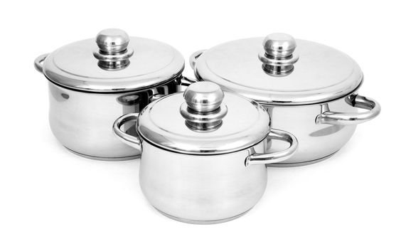 Pans made of stainless steel on a white background