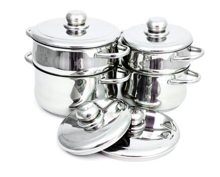 Pans made of stainless steel on a white background