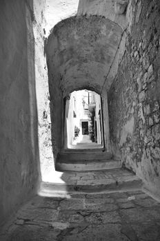 Ostuni lane with vaults in the Old Town (the White City), Puglia, Italy
