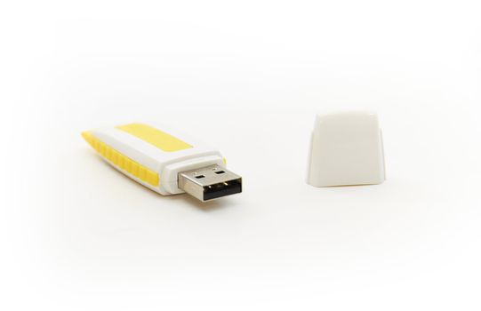 Yellow USB drive on white background