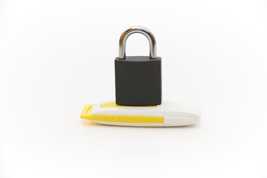 Yellow USB drive with lock key on white background