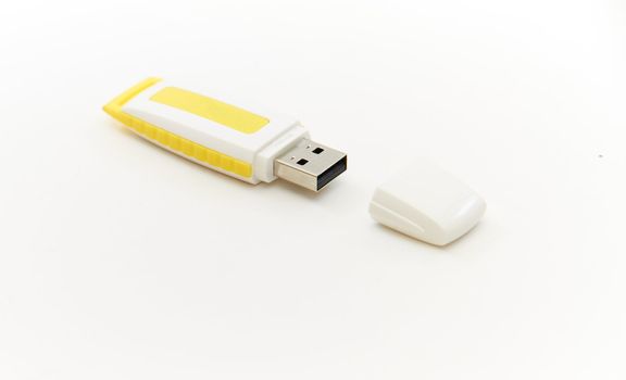 Yellow USB drive on white background