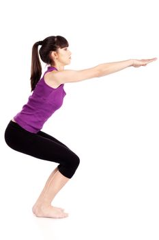 Young woman doing fitness exercises, isolate on white